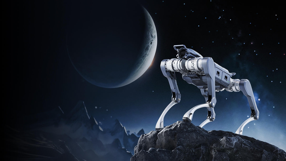 Unitree A2 quadruped robot on rocky ground under a crescent moon